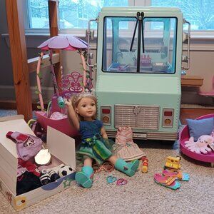 American girl doll Camille with wellie wishers carriage , clothes and accessorie